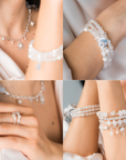 signature set of jewelry including necklaces, bracelets, and rings. white