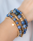 Stack of blue beaded bracelets in blue sodalite and gold vermeil, with a heart charm / Beblue Bijoux