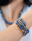 Stack of blue beaded bracelets in blue sodalite and 14kt gold vermeil, with a heart charm / Beblue Bijoux