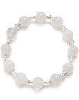 Bracelet with white beads on a white background
