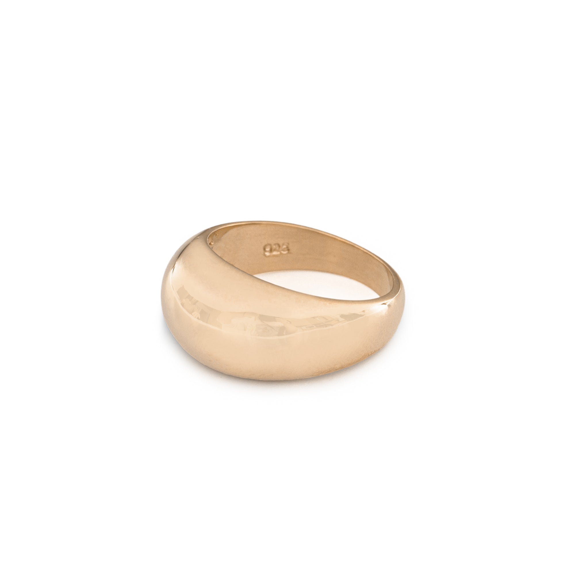 Gold ring on a white background