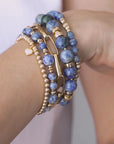 Stack of blue beaded bracelets in blue sodalite and gold vermeil, with a heart charm / Beblue Bijoux
