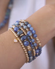 Stack of blue beaded bracelets in blue sodalite and gold vermeil, with a heart charm / Beblue Bijoux